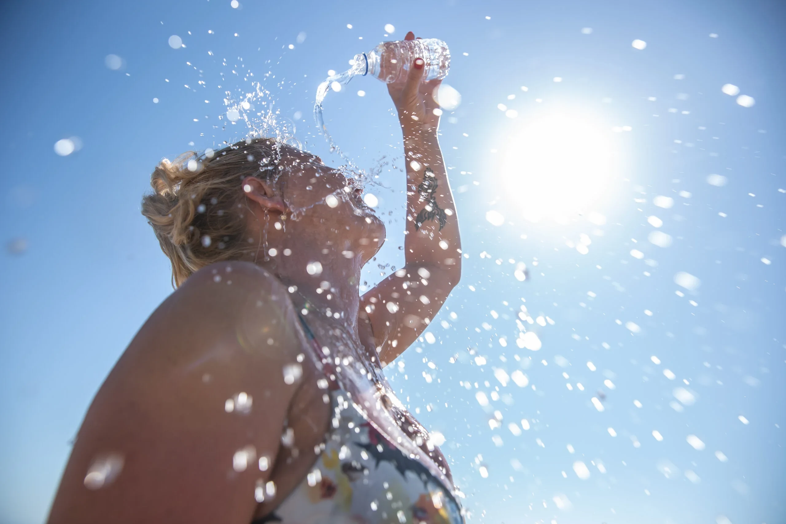 4 Signs You're a Salty Sweater and How to Hydrate Effectively, According to a Sports Dietitian